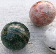 Load image into Gallery viewer, Crystal - Four piece sphere collection
